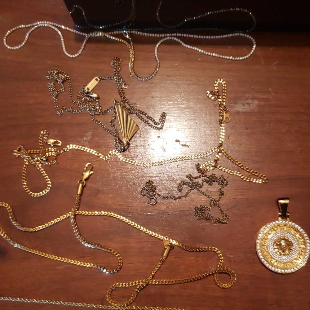 6 fake gold chains and 3 pendants